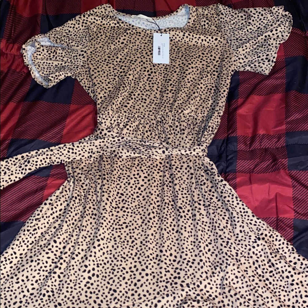 Brand new ruffle leopard print dress. Cream and black, butter soft.